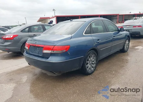 2009 Hyundai Azera Limited z USA, uszkodzony, nr VIN KMHFC46F59A357312